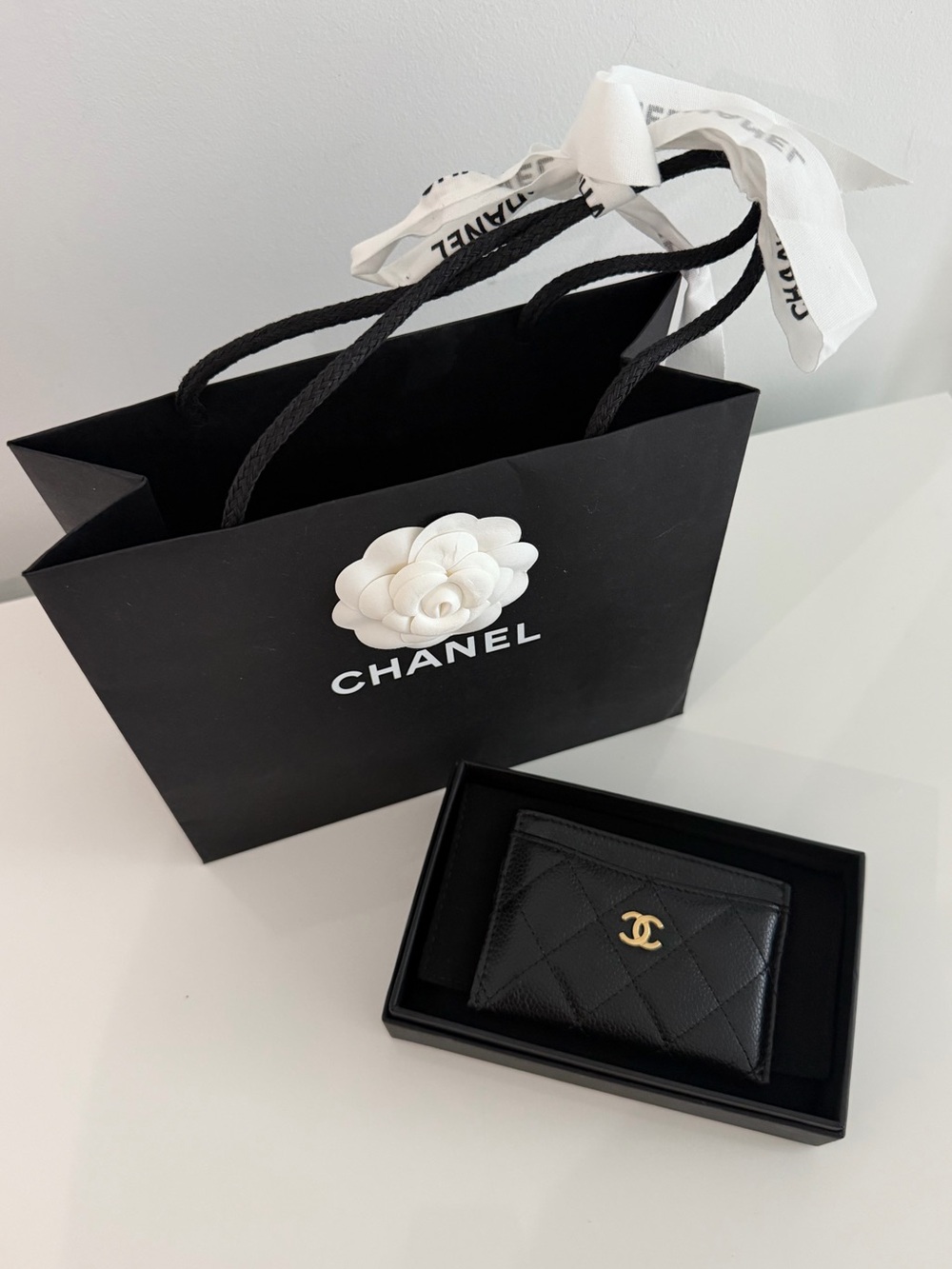 CHANEL Black Quilted Caviar Leather Wallet with Gold CC Logo